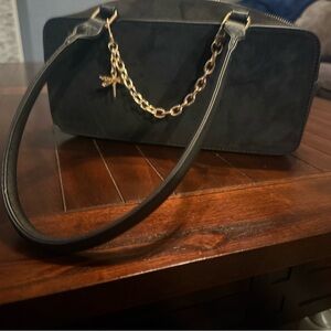 Sophisticated Black Shoulder Bag with Gold Accents
